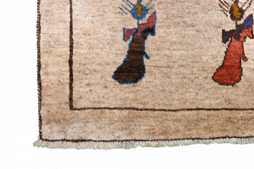 Full view of 2000s Persian Gabbeh rug from Iran / Persia, 174 × 101 cm in Beige tones