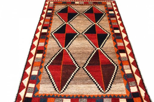 Surface texture of 2000s Persian Gabbeh rug with natural Wool and intricate pattern