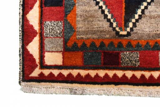 Full view of 2000s Persian Gabbeh rug from Iran / Persia, 186 × 115 cm in Beige tones