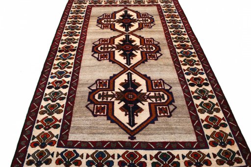 Surface texture of 2000s Persian Gabbeh rug with natural Wool and intricate pattern