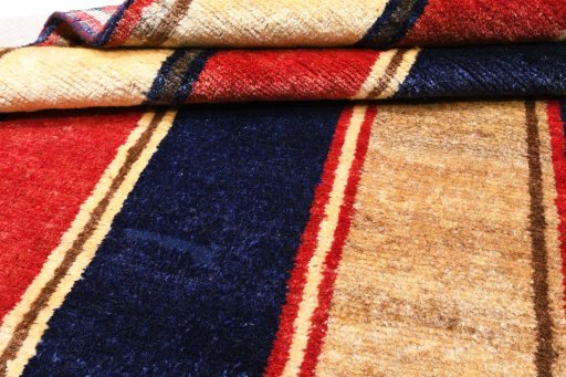 Close-up detail of 2000s Persian Gabbeh rug from Iran / Persia showing Wool weave
