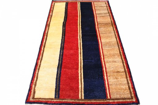 Surface texture of 2000s Persian Gabbeh rug with natural Wool and intricate pattern