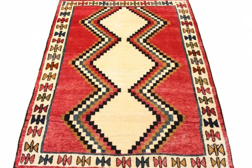 Surface texture of 2000s Persian Gabbeh rug with natural Wool and intricate pattern