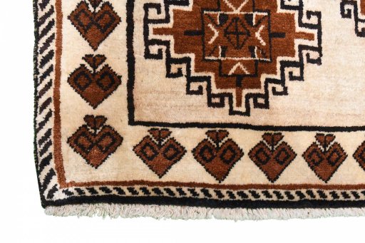 Full view of 2000s Persian Gabbeh rug from Iran / Persia, 198 × 118 cm in Beige tones