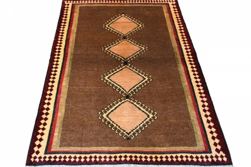 Surface texture of 1970s Persian Gabbeh rug with natural Wool and intricate pattern