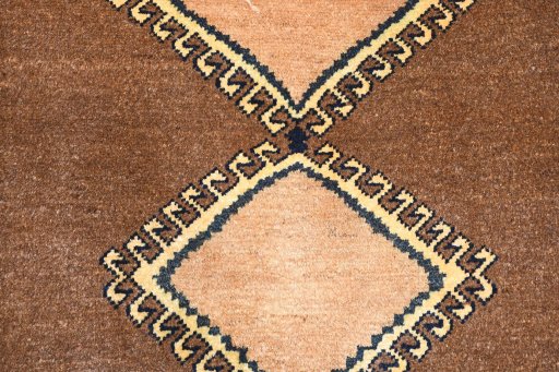 Backside of handmade 1970s Persian Gabbeh rug showing knot structure and weave density