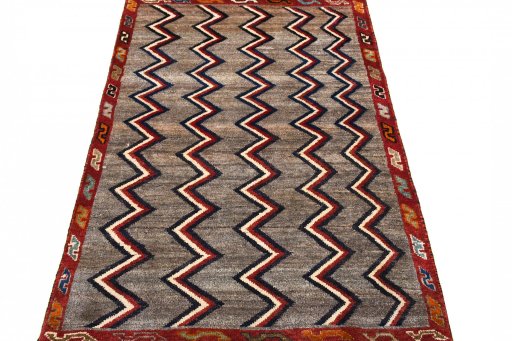 Surface texture of 2000s Persian Gabbeh rug with natural Wool and intricate pattern