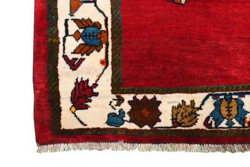 Backside of handmade 2000s Persian Gabbeh rug showing knot structure and weave density