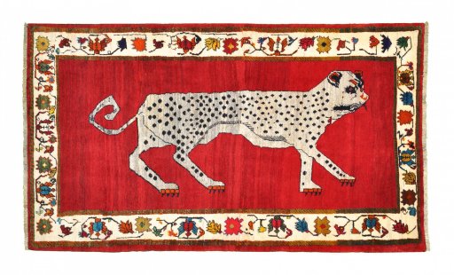 Full view of 2000s Persian Gabbeh rug from Iran / Persia, 227 × 131 cm in Red tones