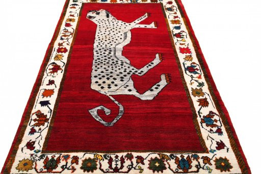 Surface texture of 2000s Persian Gabbeh rug with natural Wool and intricate pattern