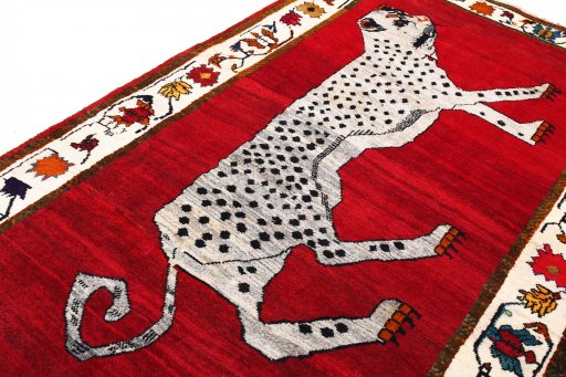 Backside of handmade 2000s Persian Gabbeh rug showing knot structure and weave density