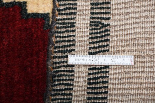 Close-up detail of 2000s Persian Gabbeh rug from Iran / Persia showing Wool weave