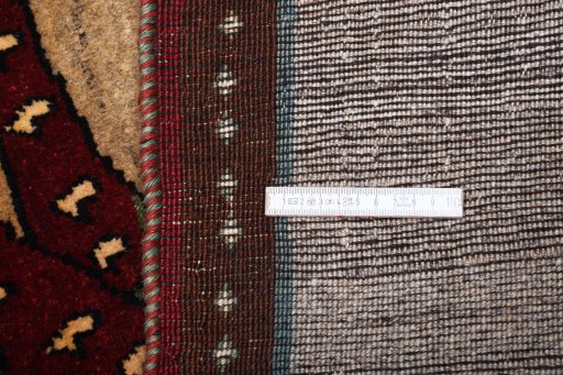 Backside of handmade 2000s Persian Gabbeh rug showing knot structure and weave density