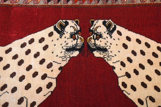 Backside of handmade 2000s Persian Gabbeh rug showing knot structure and weave density