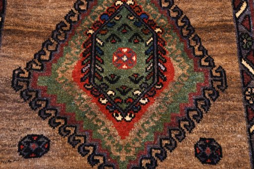 Backside of handmade 2000s Persian Gabbeh rug showing knot structure and weave density