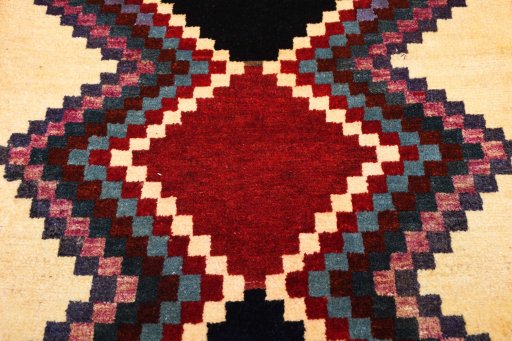 Central medallion detail of 2000s Persian Gabbeh rug from Iran / Persia