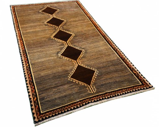 Corner detail of 2000s Persian Gabbeh rug showing border pattern and Wool pile