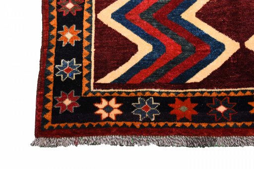Full view of 2000s Persian Gabbeh rug from Iran / Persia, 228 × 130 cm in Red tones