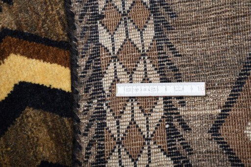 Close-up detail of 2000s Persian Gabbeh rug from Iran / Persia showing Wool weave