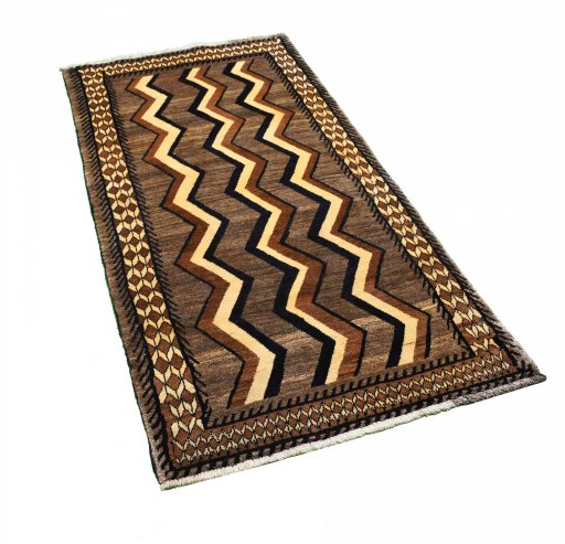 Corner detail of 2000s Persian Gabbeh rug showing border pattern and Wool pile