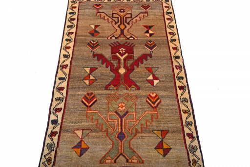 Surface texture of 2000s Persian Gabbeh rug with natural Wool and intricate pattern