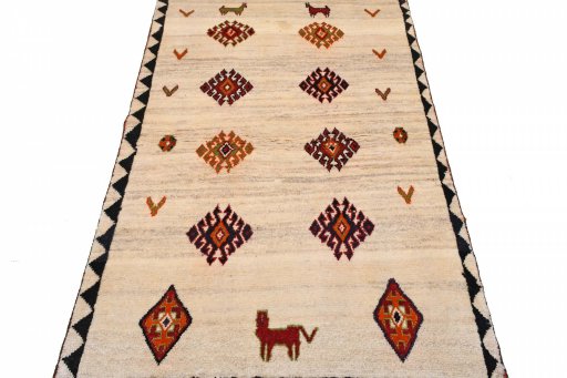 Surface texture of 2000s Persian Gabbeh rug with natural Wool and intricate pattern