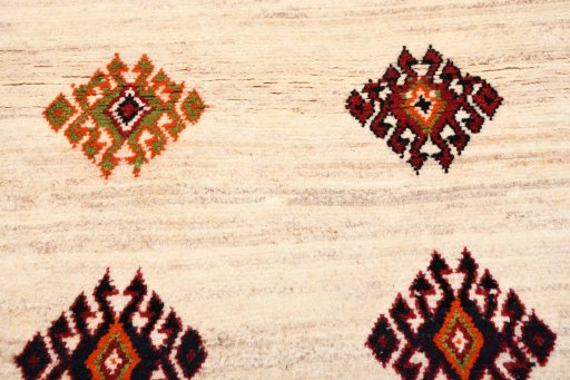 Central medallion detail of 2000s Persian Gabbeh rug from Iran / Persia