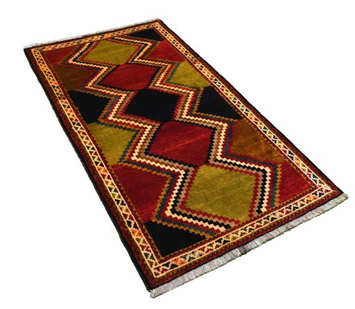 Corner detail of 2000s Persian Gabbeh rug showing border pattern and Wool pile