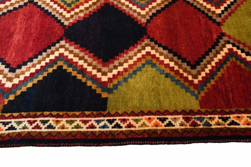 Close-up detail of 2000s Persian Gabbeh rug from Iran / Persia showing Wool weave