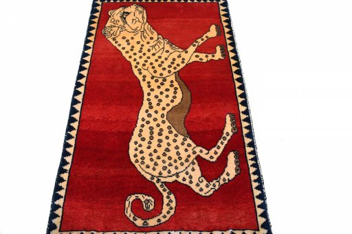 Surface texture of 2000s Persian Gabbeh rug with natural Wool and intricate pattern