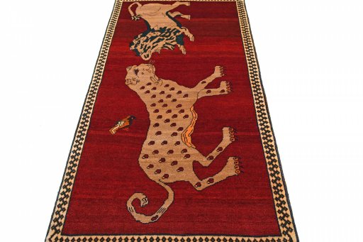 Surface texture of 2000s Persian Gabbeh rug with natural Wool and intricate pattern