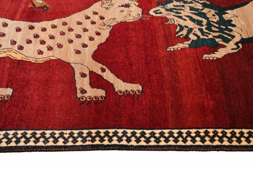 Full view of 2000s Persian Gabbeh rug from Iran / Persia, 200 × 106 cm in Red tones