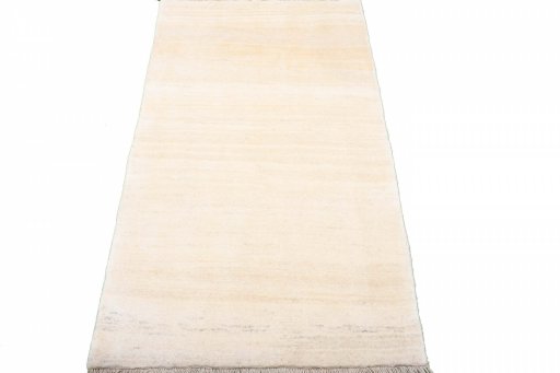 Surface texture of 2000s Persian Gabbeh rug with natural Wool and intricate pattern