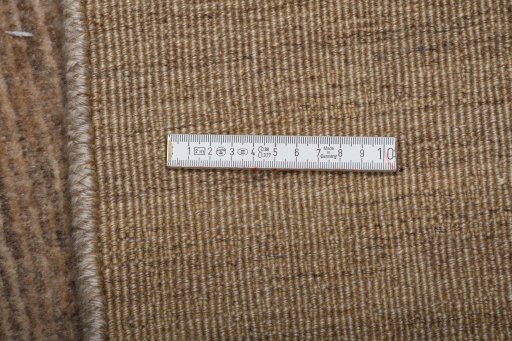 Corner detail of New Persian Gabbeh rug showing border pattern and Wool pile