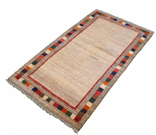 Close-up detail of 2000s Persian Gabbeh rug from Iran / Persia showing Wool weave