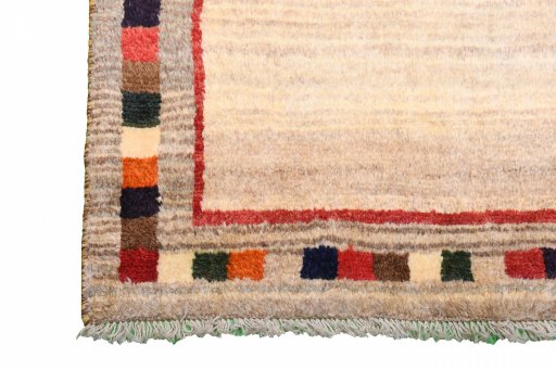 Close-up detail of 2000s Persian Gabbeh rug from Iran / Persia showing Wool weave