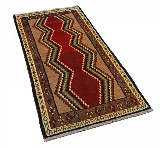 Corner detail of 2000s Persian Gabbeh rug showing border pattern and Wool pile