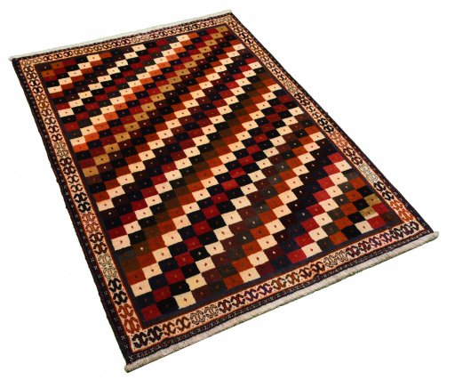 Corner detail of 2000s Persian Gabbeh rug showing border pattern and Wool pile