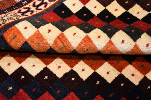 Full view of 2000s Persian Gabbeh rug from Iran / Persia, 160 × 115 cm in Multi Color tones