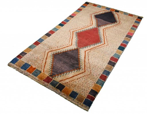 Close-up detail of 2000s Persian Gabbeh rug from Iran / Persia showing Wool weave