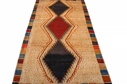 Surface texture of 2000s Persian Gabbeh rug with natural Wool and intricate pattern