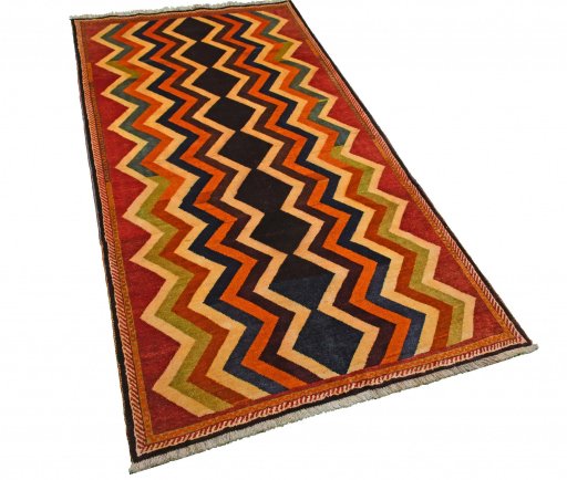 Corner detail of 2000s Persian Gabbeh rug showing border pattern and Wool pile