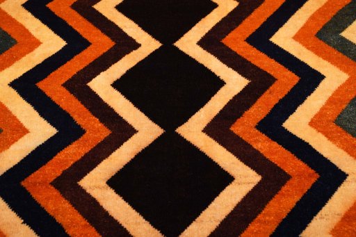 Central medallion detail of 2000s Persian Gabbeh rug from Iran / Persia