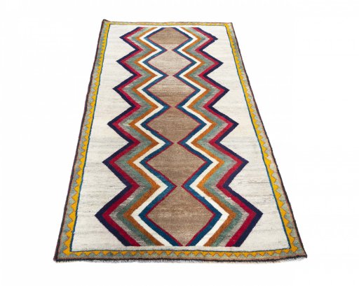 Surface texture of 2000s Persian Gabbeh rug with natural Wool and intricate pattern