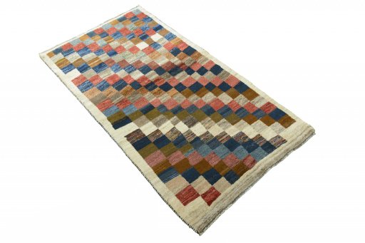 Close-up detail of 2000s Persian Gabbeh rug from Iran / Persia showing Wool weave