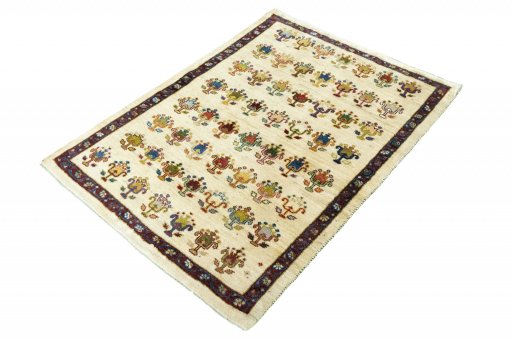 Corner detail of 2000s Persian Gabbeh rug showing border pattern and Wool pile