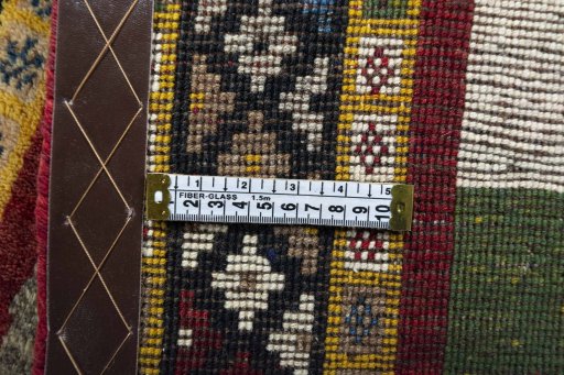 Close-up detail of 2000s Persian Gabbeh rug from Iran / Persia showing Wool weave