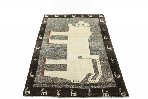 Surface texture of 2000s Persian Gabbeh rug with natural Wool and intricate pattern
