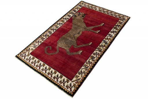 Corner detail of 2000s Persian Gabbeh rug showing border pattern and Wool pile