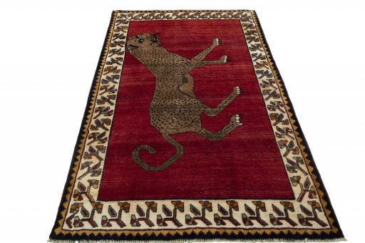Surface texture of 2000s Persian Gabbeh rug with natural Wool and intricate pattern